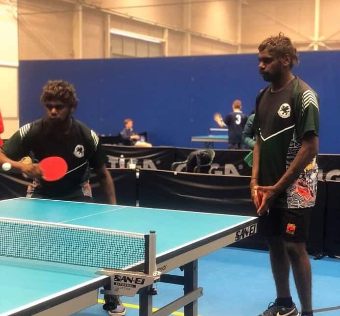 Tyler and Tashiem Abbott having a hit of table tennis.