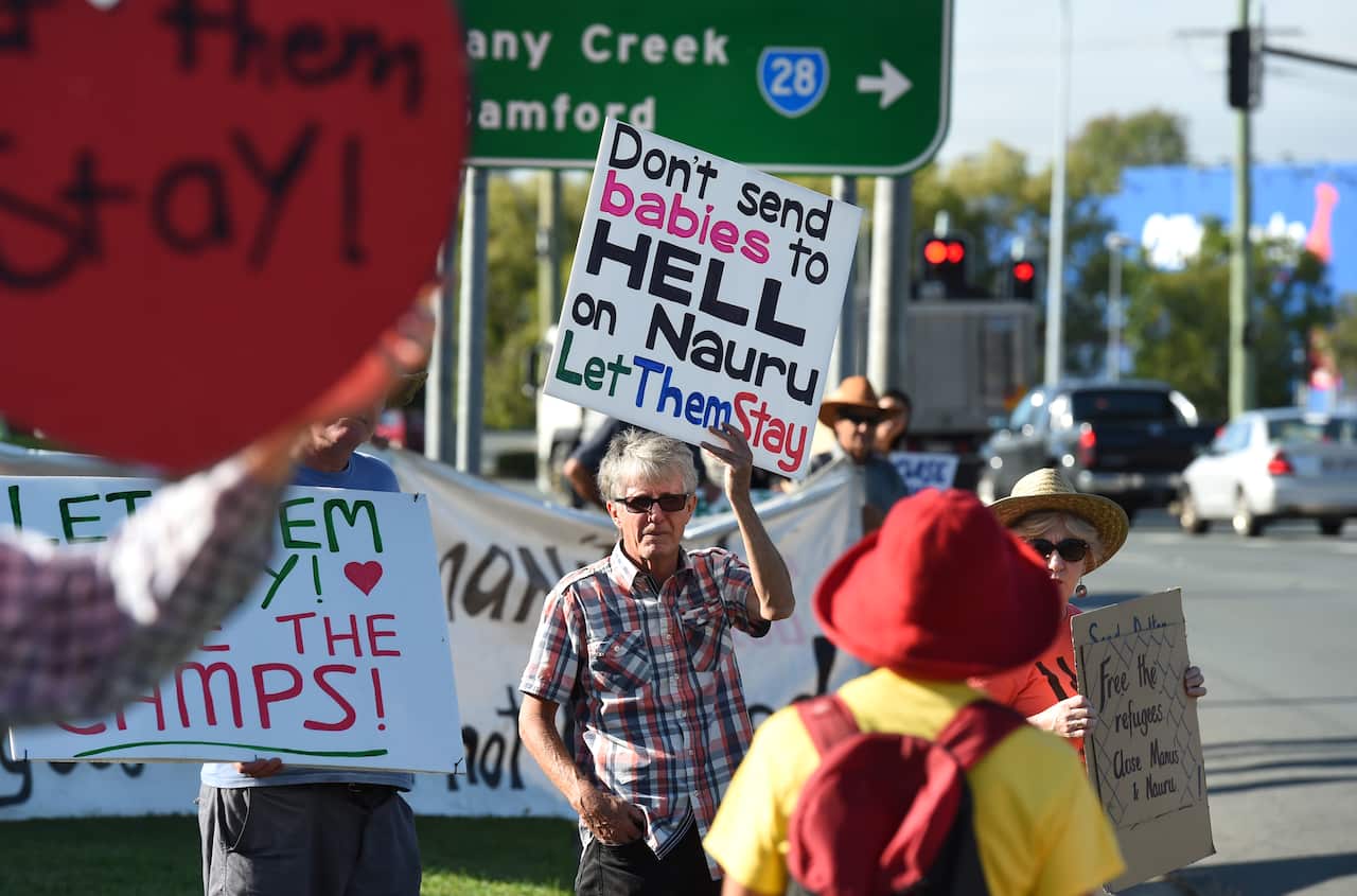 Refugee activists protest outside the electoral office of Immigration Minister Peter Dutton in 2016.