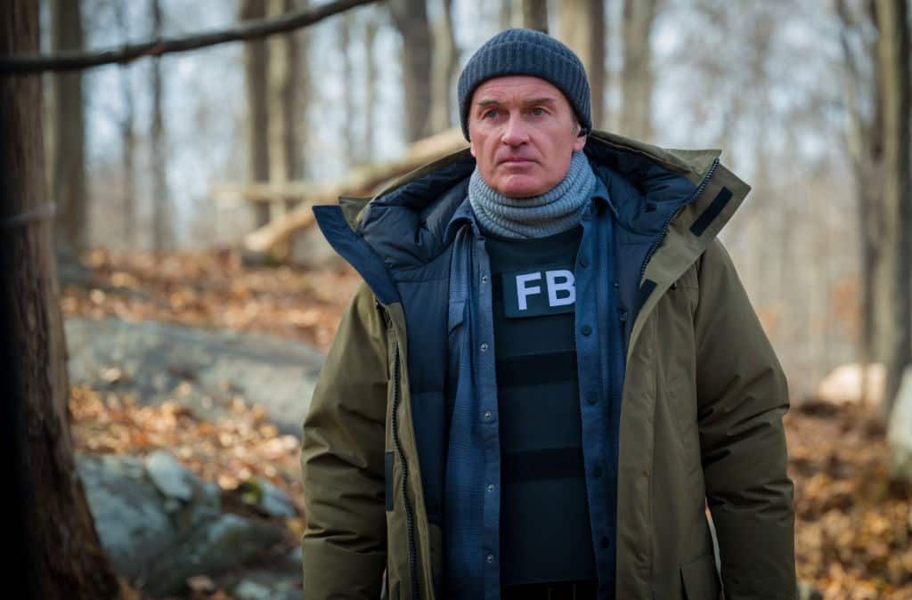A man stars in a television series wearing an FBI uniform. 