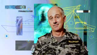 A man wearing an army uniform. A digitally created ship is in the background.