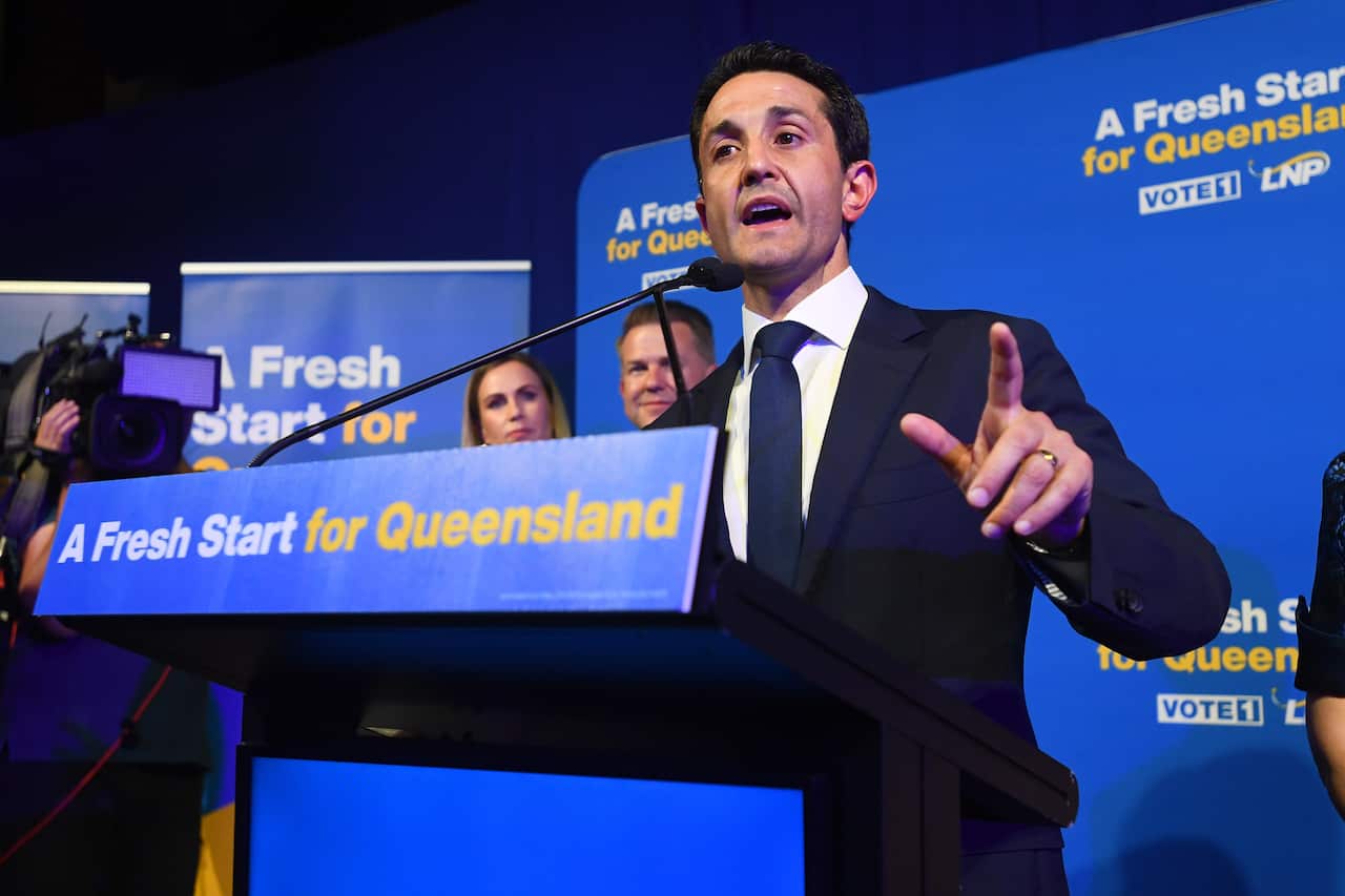 David Crisafulli speaking into a microphone at a podium. It reads "A Fresh Start for Queensland".