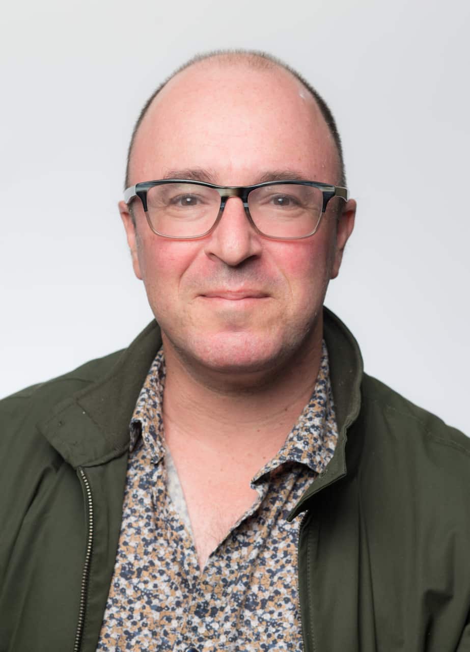 A man wearing glasses.