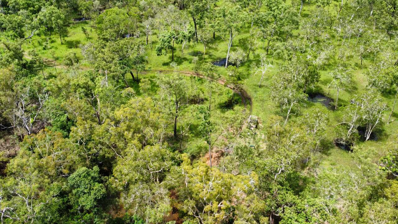 An aerial view of a truck bogged down in a Queensland park