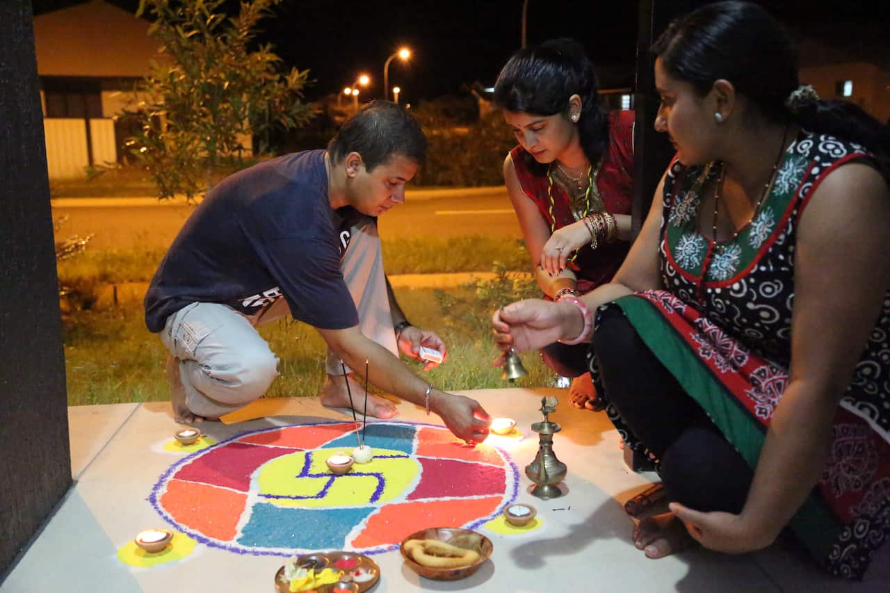 Queensland resident Nitesh Raj Pant celebrating Tihar with his family.