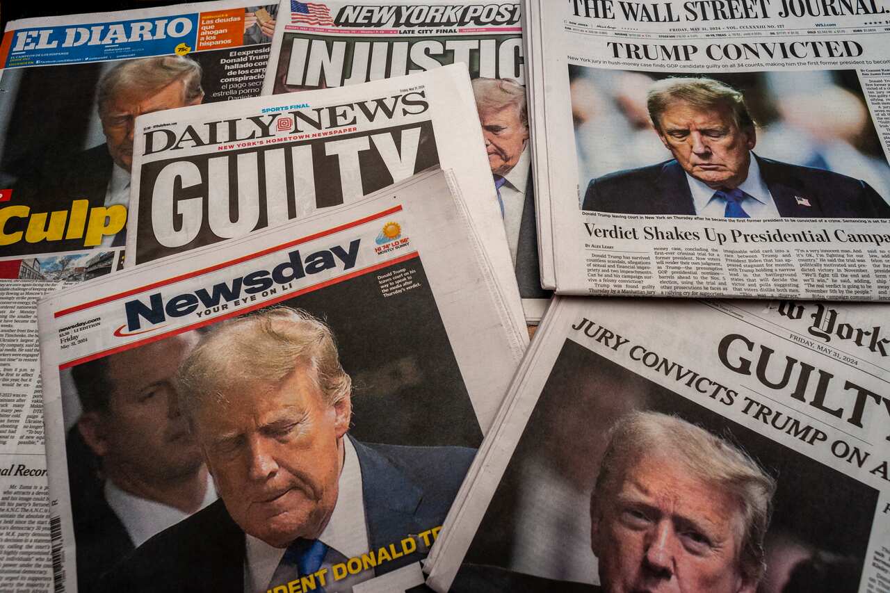 A stack of different newspaper headlines reporting on the guilty verdict in Trump's hush money trial 