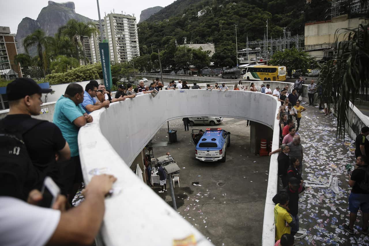 People queue to vote in Brazil's general election.