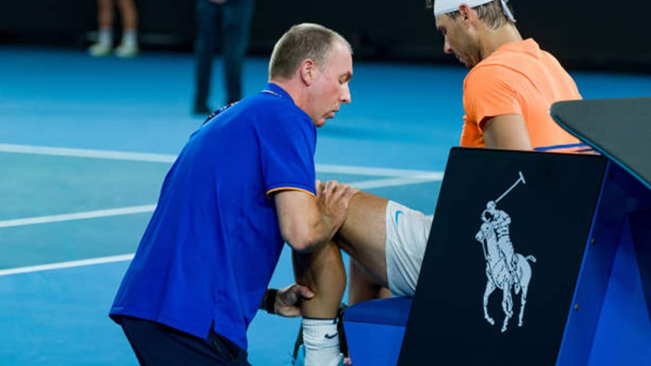 Rafael Nadal of Spain receives medical attention in the round two singles match .jpg