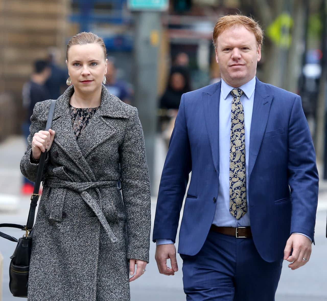 A man and woman walking