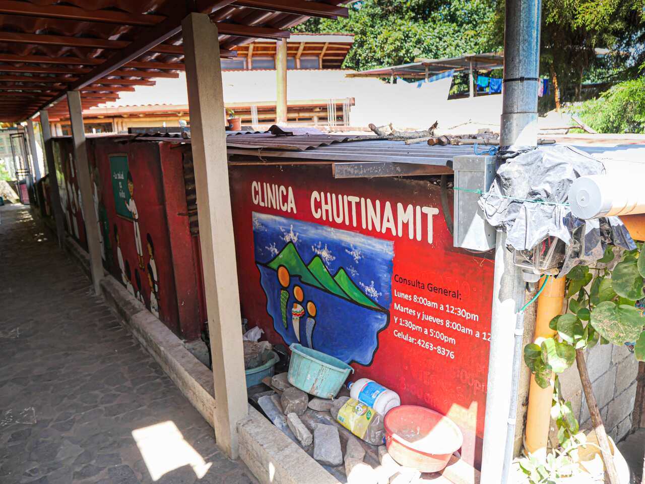 Tucked away down an alley, only signified by the red paint on the wall is Clinic Chuítinamit in San Pablo.jpg