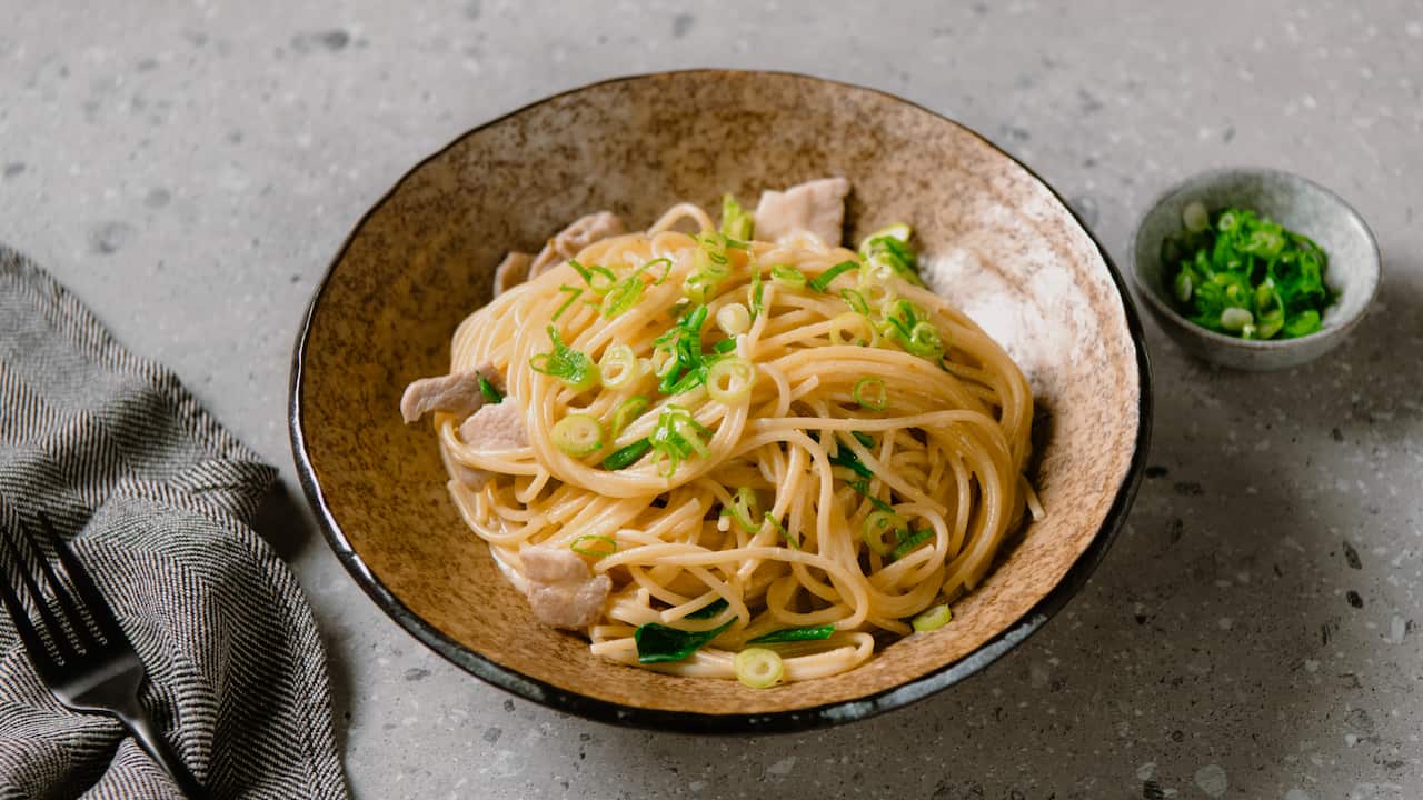 Japanese pasta with pork belly, cream and yuzu kosho