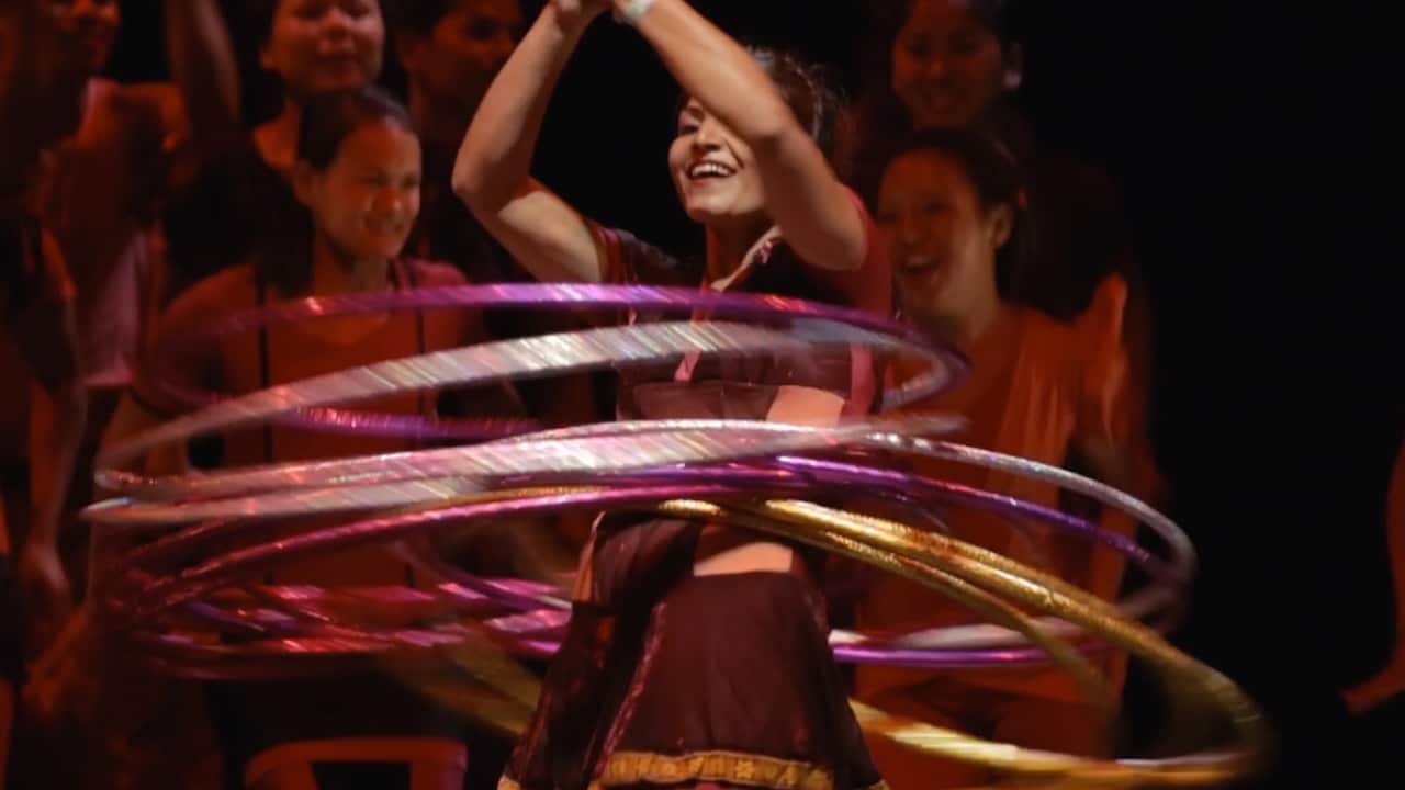  A woman hula hooping.