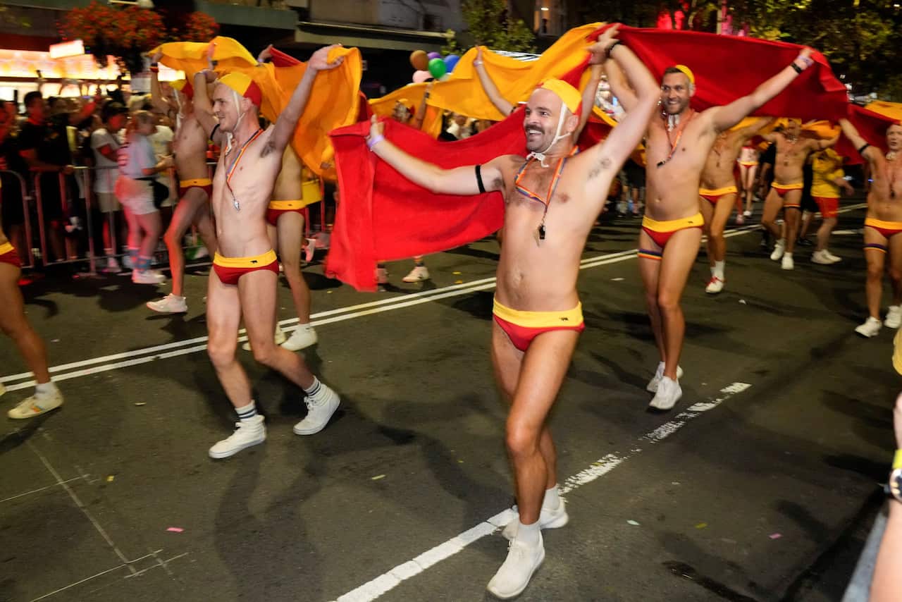 Participants perform in the 45th Anniversary Sydney Gay and Lesbian Mardi Gras Parade in Oxford Street, Sydney