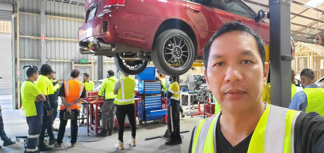 Laurence Bala as a student automotive mechanic.jpg