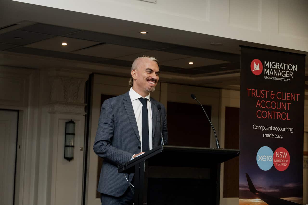 A man speaking at a podium