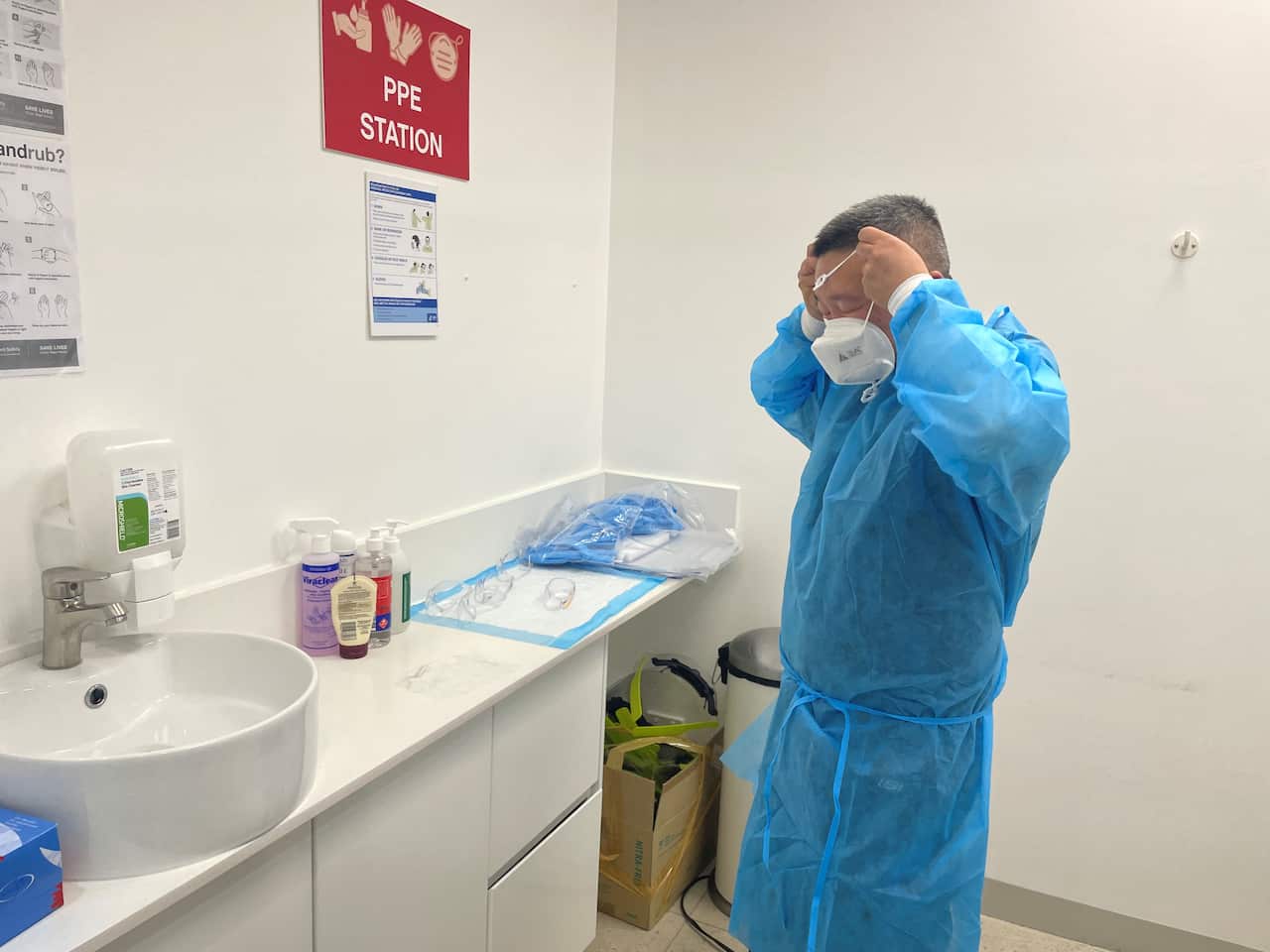 Dr Dong Hua works with COVID-19 positive people day in, and day out at respiratory clinics in Fairfield and Campbelltown