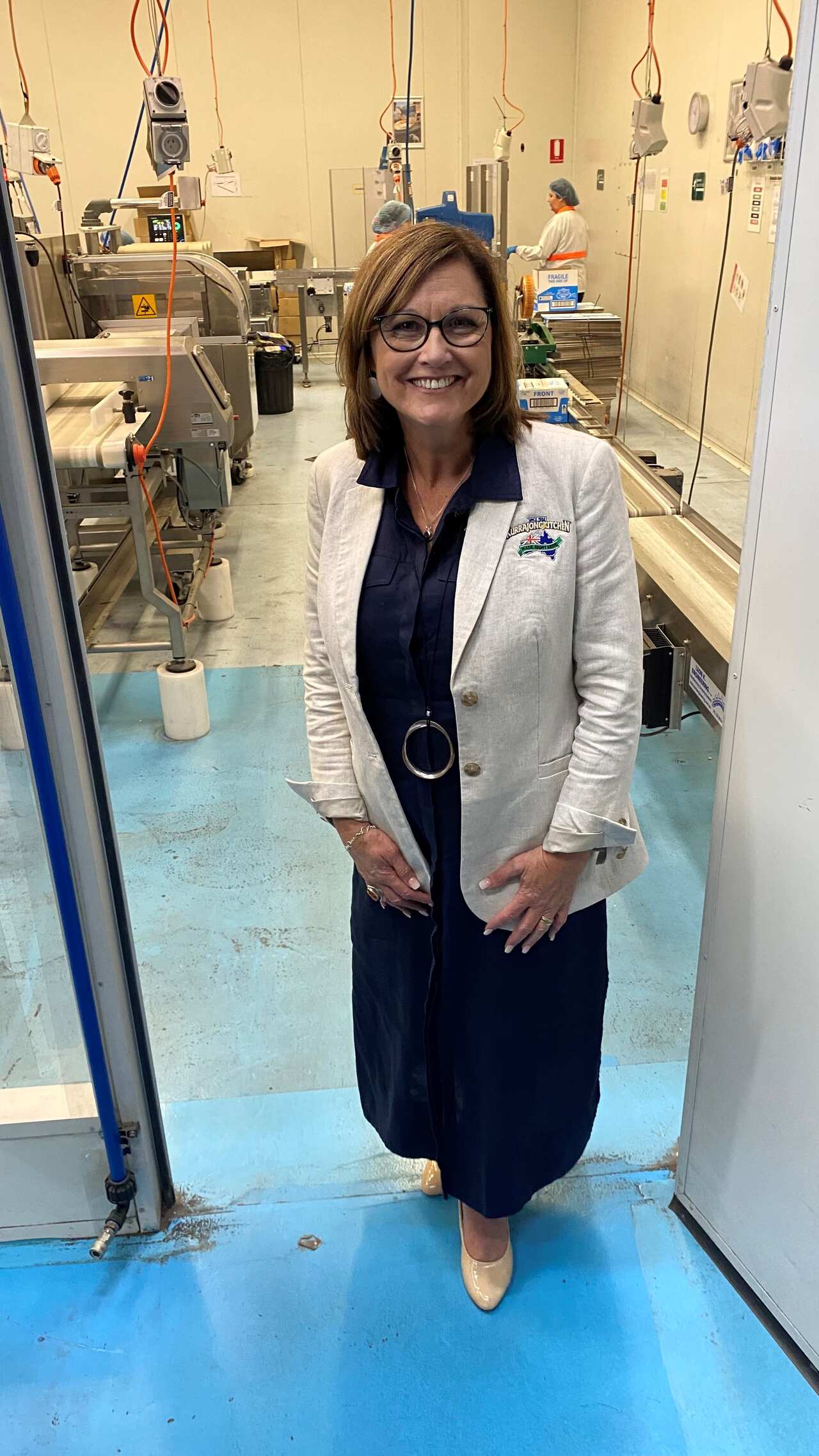 A woman standing in a doorway