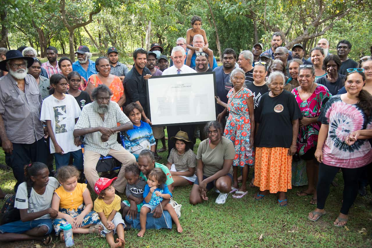 Indigenous Australians Minister Ken Wyatt with members of the Kakadu Aboriginal Land Trust at a land handback ceremony in the Northern Territory.
