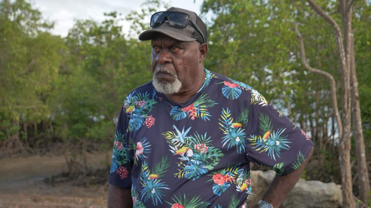 Uncle Paul Kabai describing the erosion only metres away from the islands sewerage treatment facility on climate impacts tour_2_Photo Ruby Mitchell.jpg
