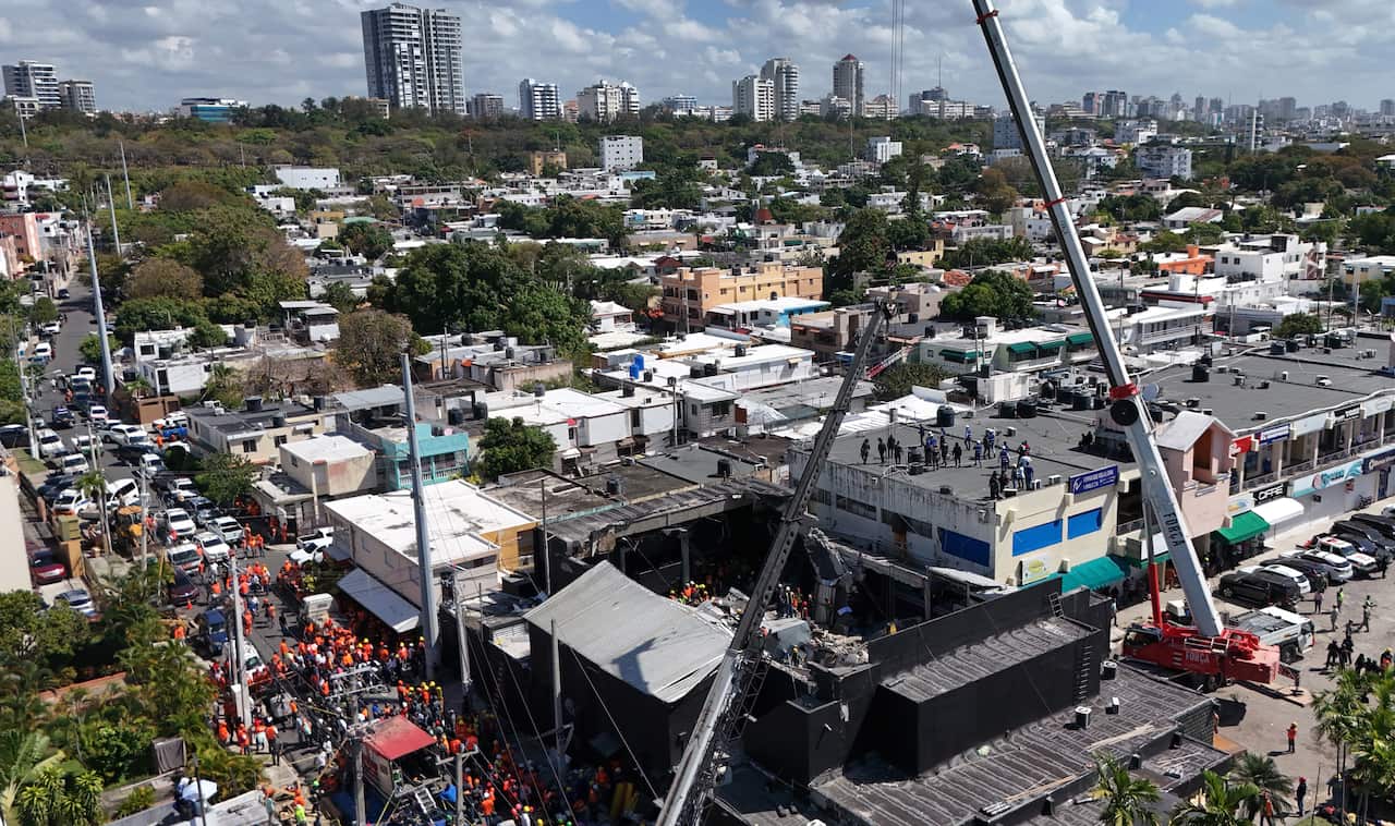Aerial view of a collapsed roof on a large building