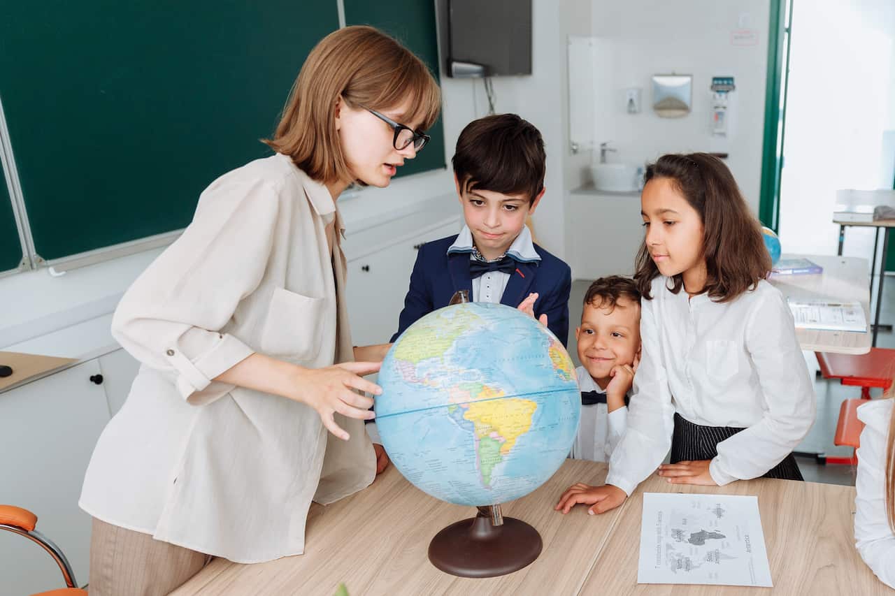 classtoom_school-teacher discussing geography with students-pexels-thirdman.jpg