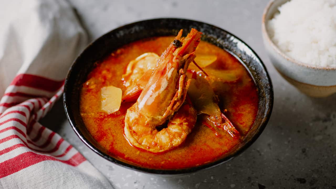 Sour orange curry with Tiger Prawns