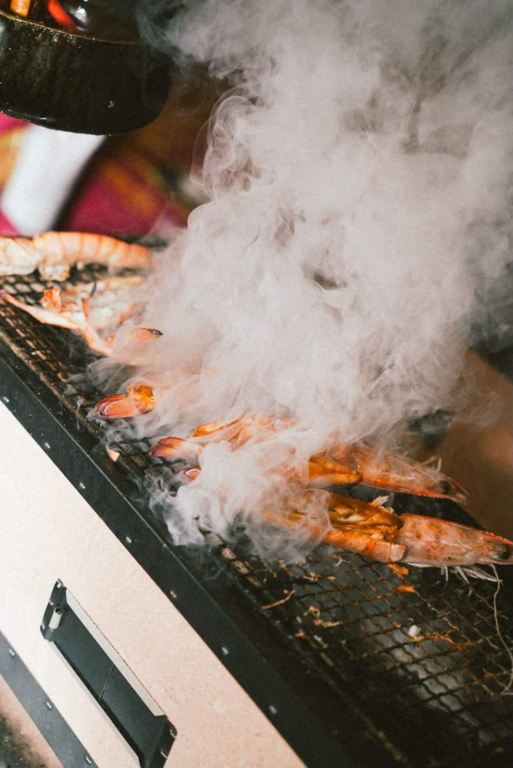 Prawns are grilled fresh on the spot at the Satu Jiwa pop-up in a bar in Footscray, Melbourne.