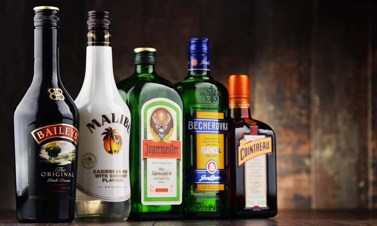 Bottles of assorted global liqueur brands