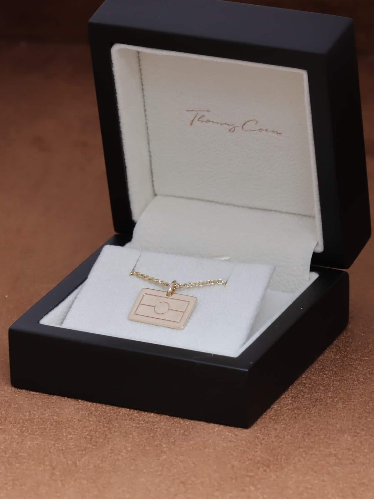 Thomas Coen_Aboriginal flag necklacae.jpg