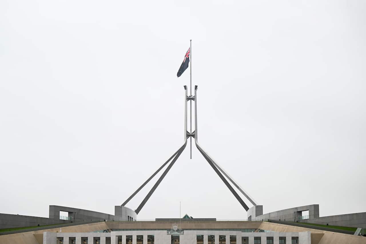 Flag flies at half mast at Australia's Parliament house