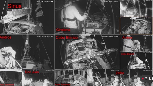 An image featuring a grid of black-and-white night-vision camera feeds, likely monitoring multiple sailing yachts or vessels during a nighttime voyage.

The main grid displays six large video frames, complemented by four smaller feeds stacked on the right edge. Most frames depict the decks, cockpits, and steering stations of different boats under low-light or infrared conditions. Several feeds show individuals at the helm, wearing harnesses or cold-weather gear, managing the rigging or steering through the dark.