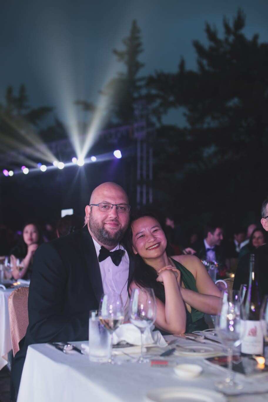 Cheng Lei pictured with her partner, Nick Coyle at a dinner