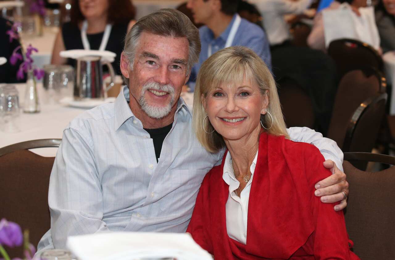 Olivia Newton-John and her husband John Easterling pose for a photograph