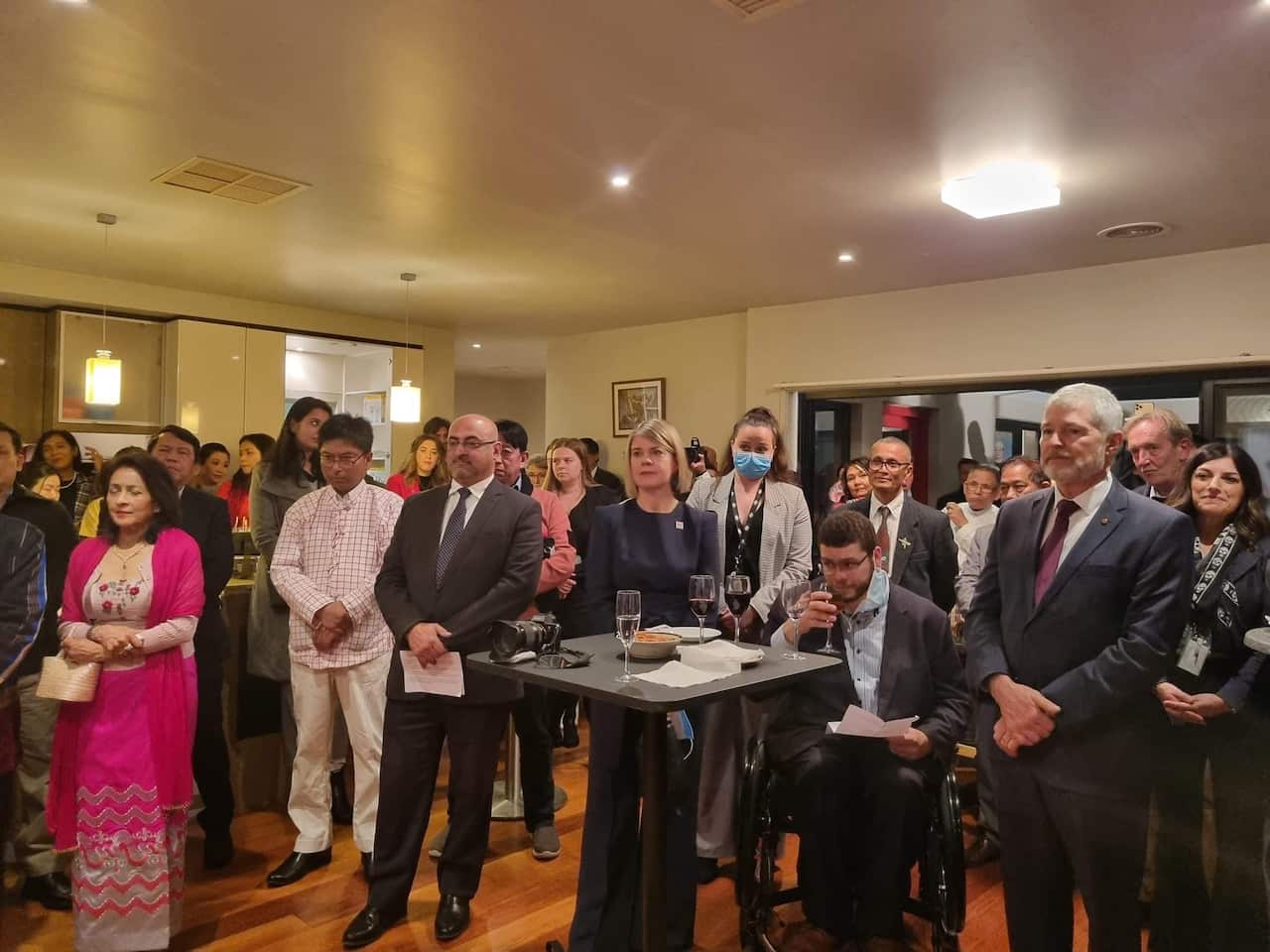 Members of parliament attend the opening ceremony of the National Unity Government's representative office in Canberra.