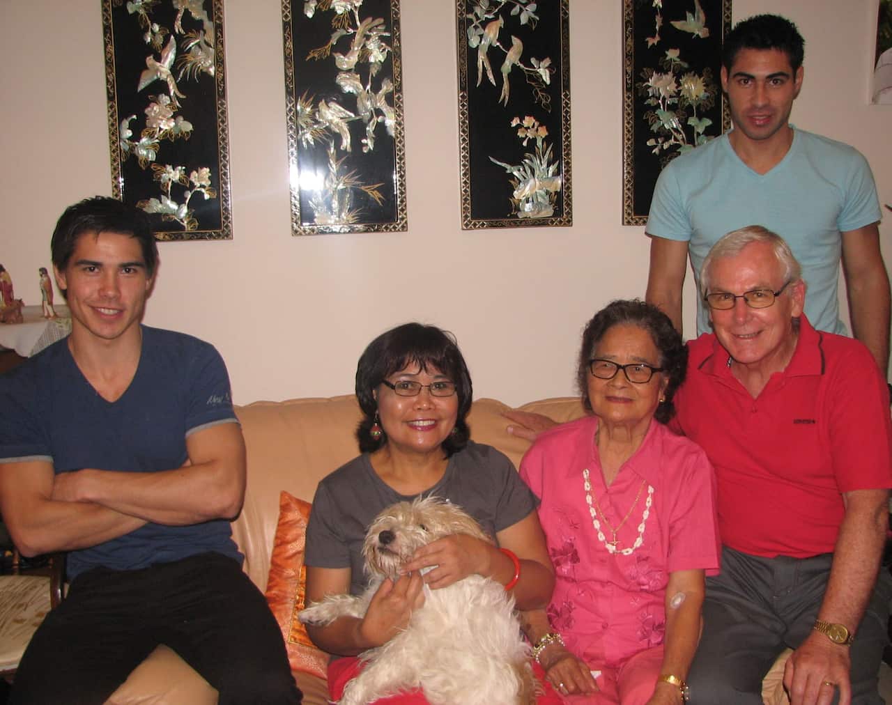 Violi Calvert's family with Nanay and Snoopy.jpg