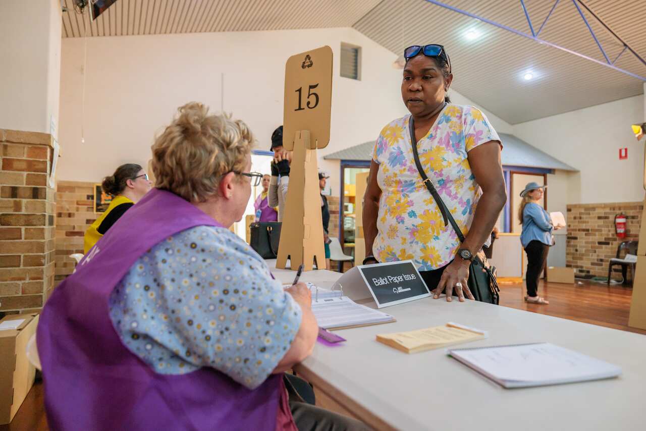 Members of the public vote in the Voice referendum