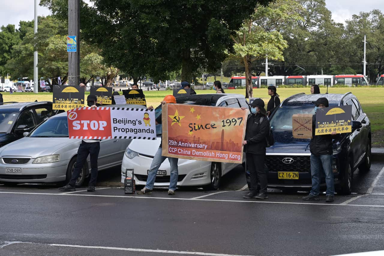 Protesters gather outside the Experience Hong Kong event in Sydney on Saturday, August 27, 2022.