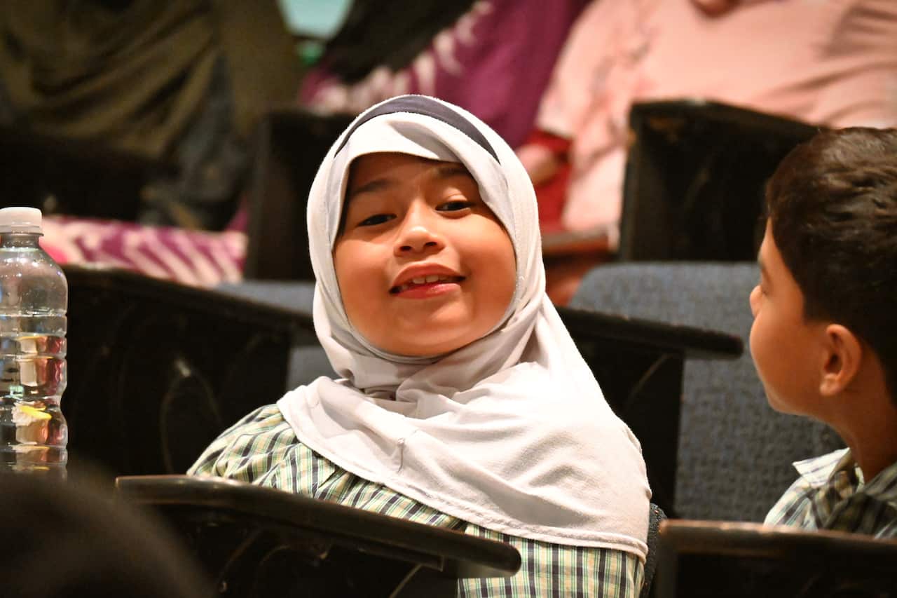Seven year old Bonnisha attending the graduation at the Australian International Islamic College in Darwin 