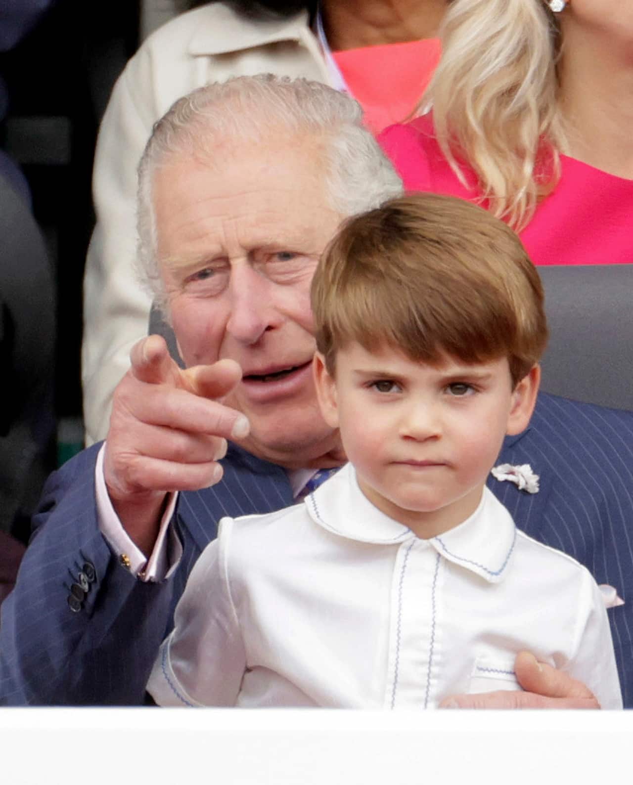 A child sitting on a man's lap.