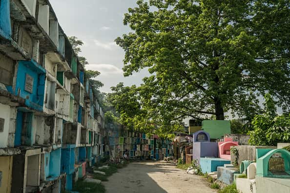 A graveyard with stacked graves