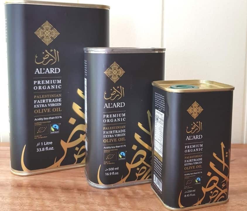 Three large tins of olive oil