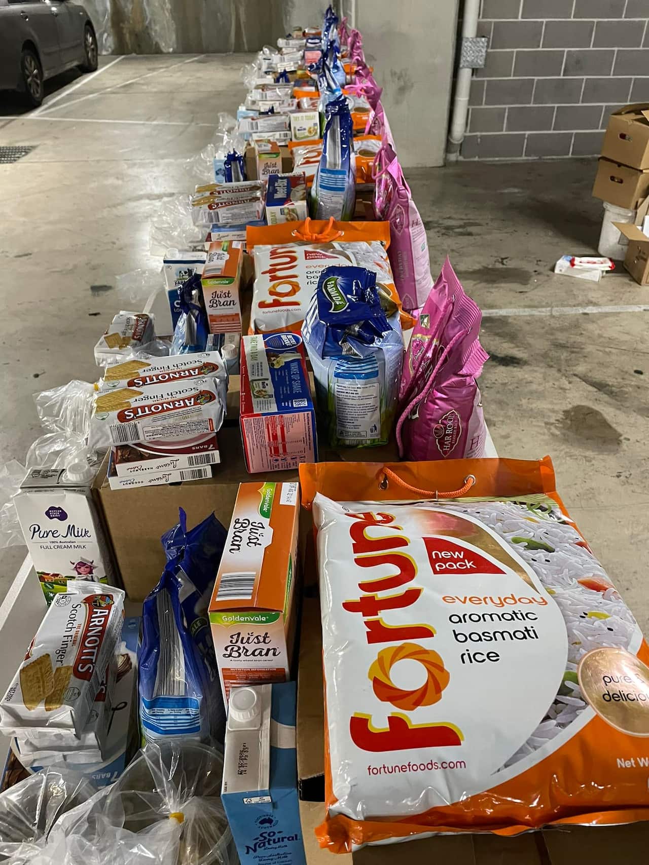 A long table full of groceries