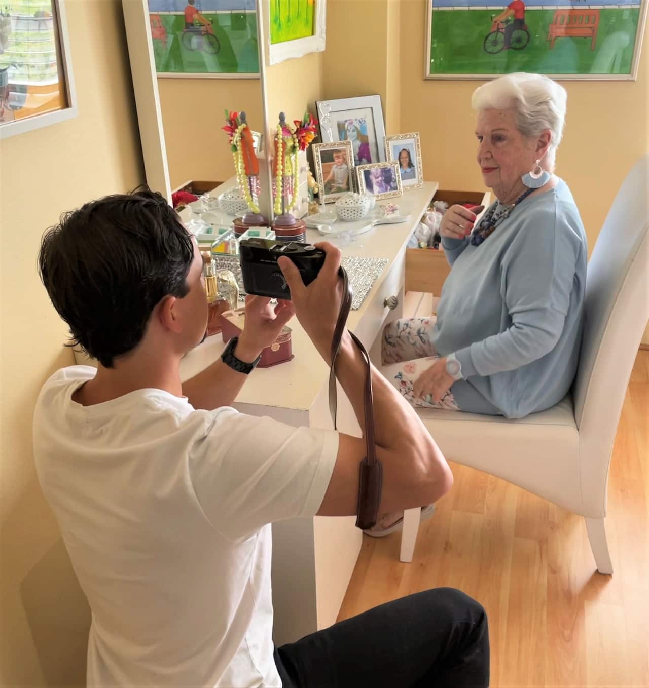 Christopher Ireland photographing Nancy Parry at home