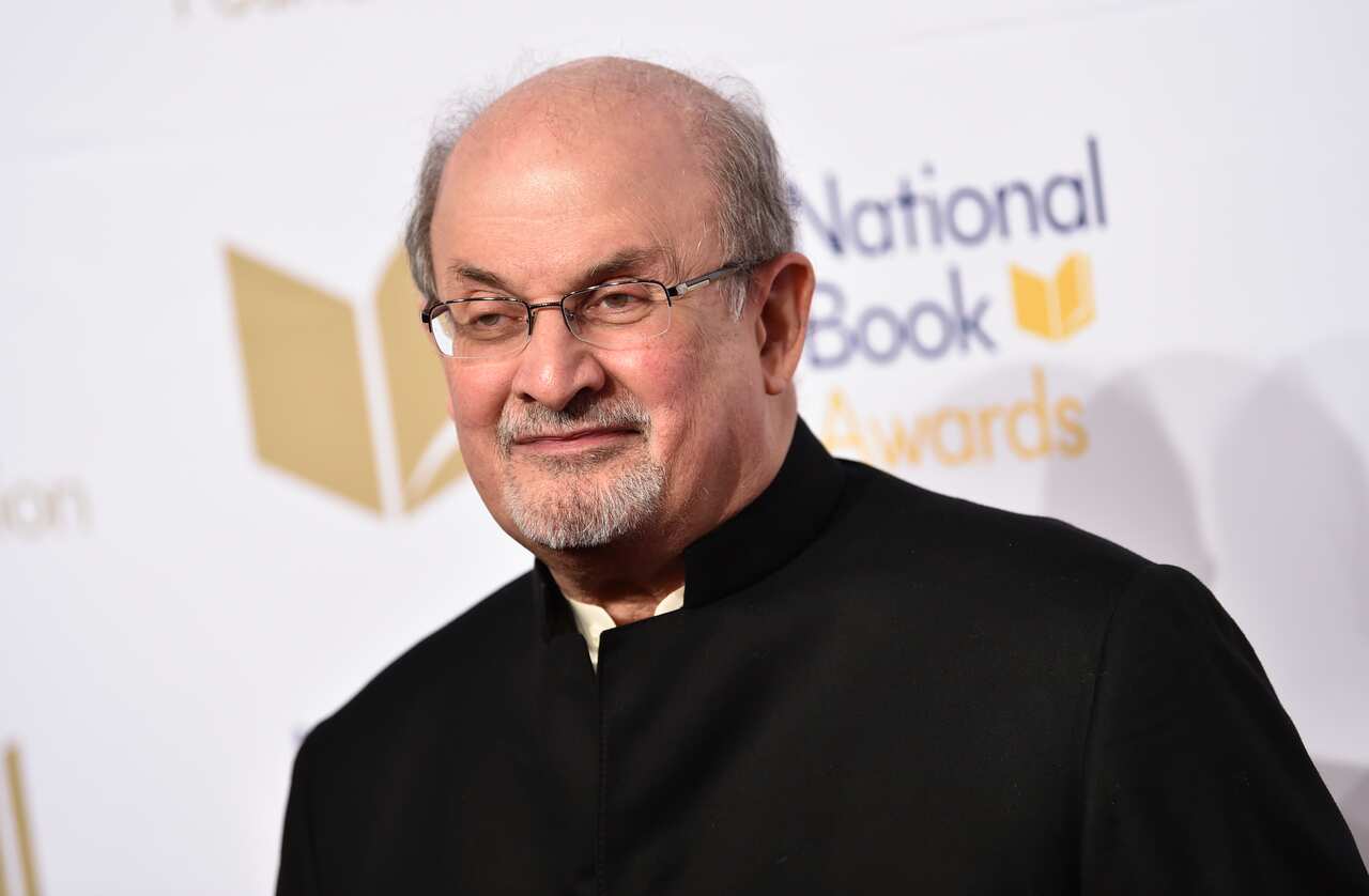 Salman Rushdie in a suit