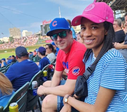 A woman and man at a sports game