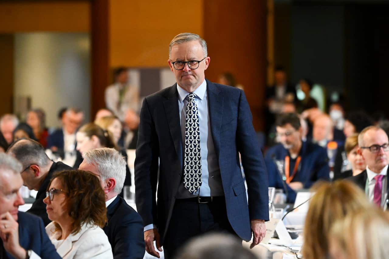 Anthony Albanese standing at the Jobs and Skills Summit.