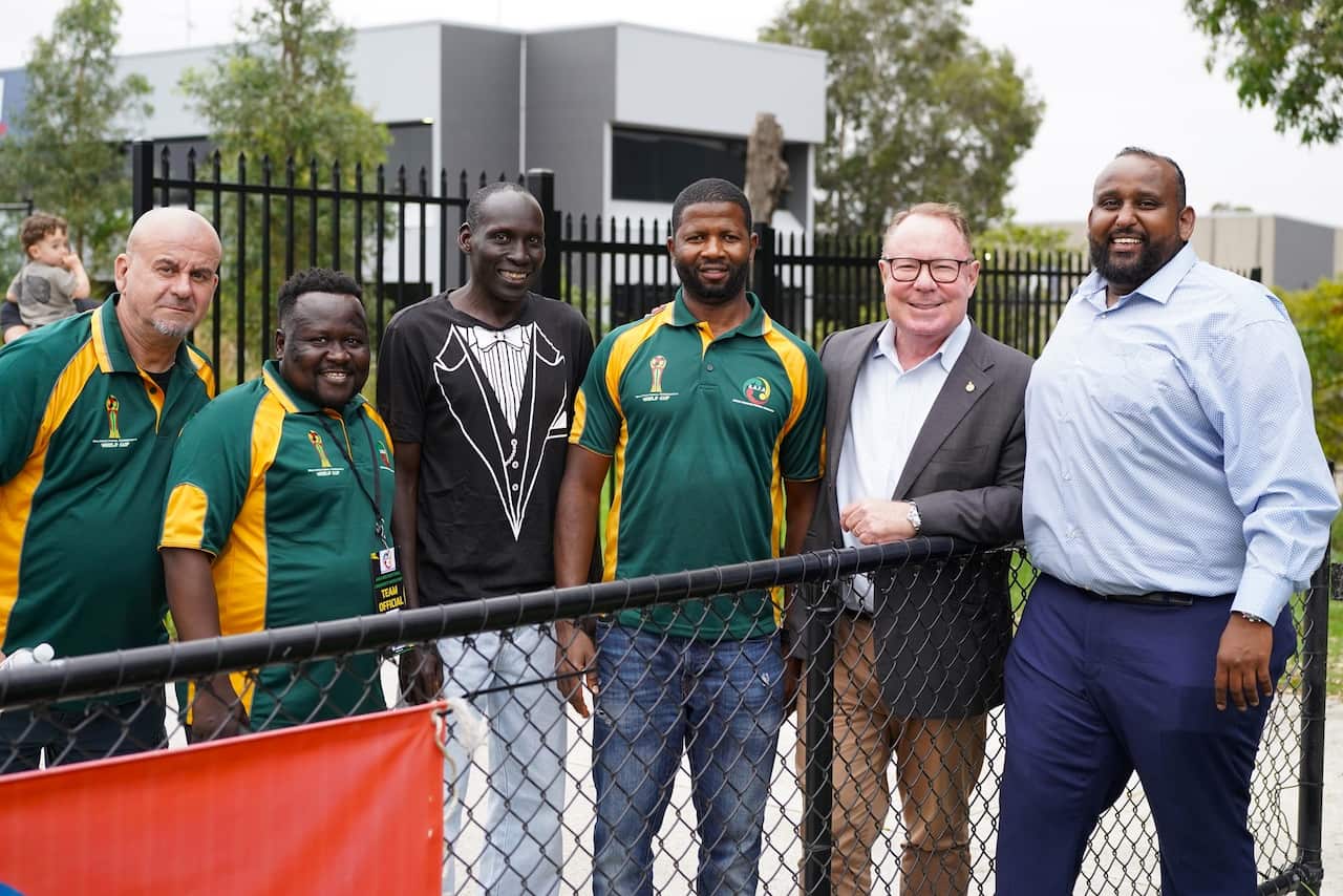 Hugh McDermott  with organiser of Multiculture Communities World Cup