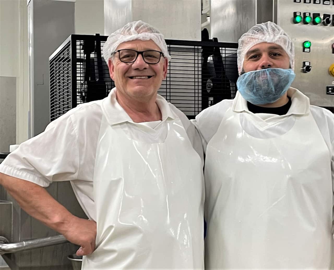 Vito Minoia (left) standing with his son, Guiseppe.