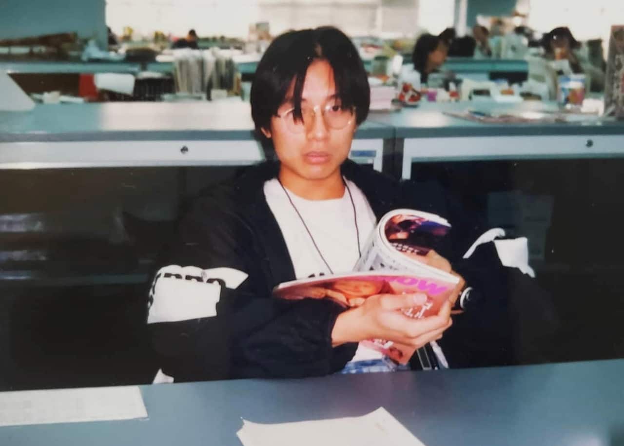 Amos Wong Ho-yin working at the Oriental Press Group's office in 1997.