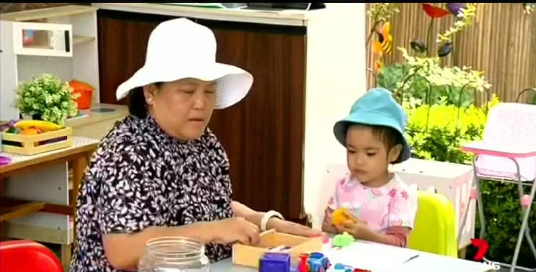 Jeanette with a kid.JPEG