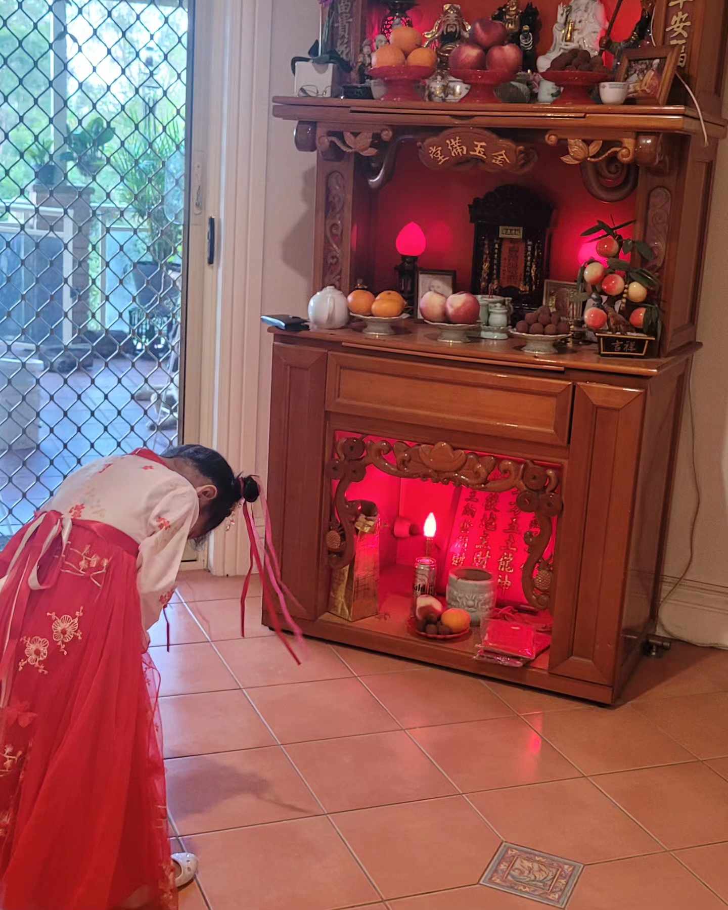 Lighting up incense sticks to pay respect to ancestors who had passed on